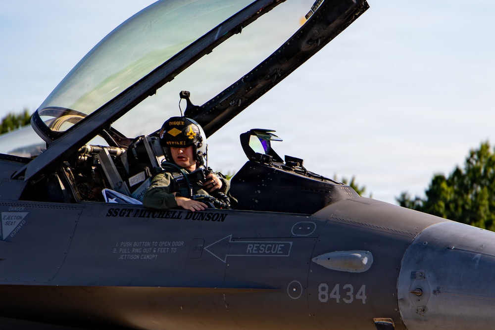 F-16 pilot completes preflight procedures
