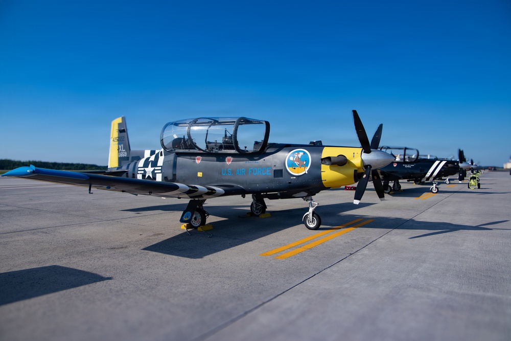 Historic aircraft line the flightline