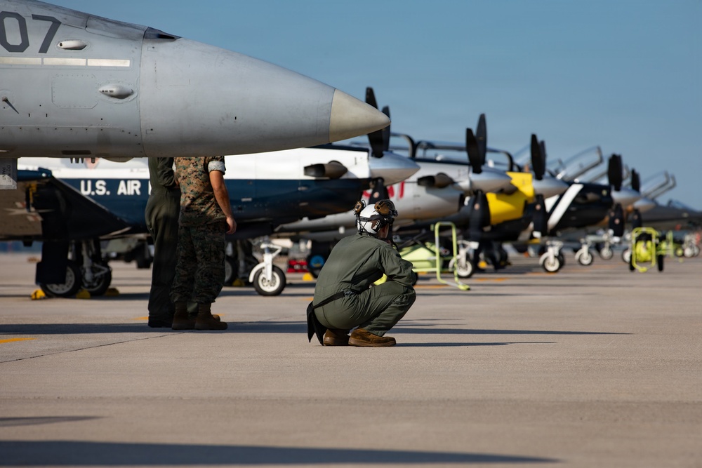 Flightline personnel support launch operations