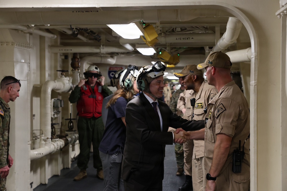John M. Barrett, Chargé d’Affaires for the U.S. Embassy in Venezuela, is welcomed aboard the San Antonio-class amphibious transport dock ship USS Fort Lauderdale.