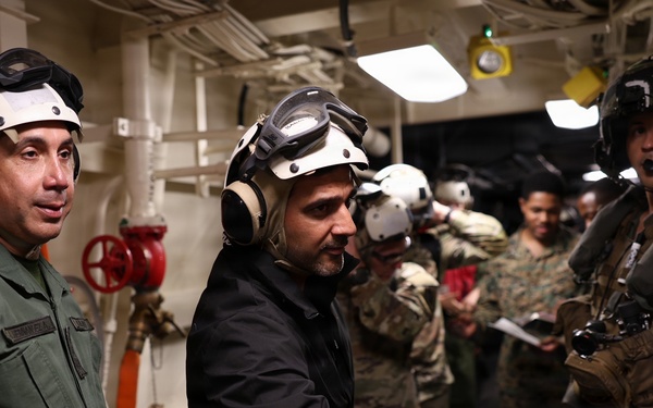 José Alejandro Teran, governor of La Guaira is welcomed aboard the San Antonio-class amphibious transport dock ship USS Fort Lauderdale.