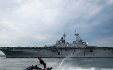 Coast Guard personal watercraft operates in New York Harbor during Sail 250