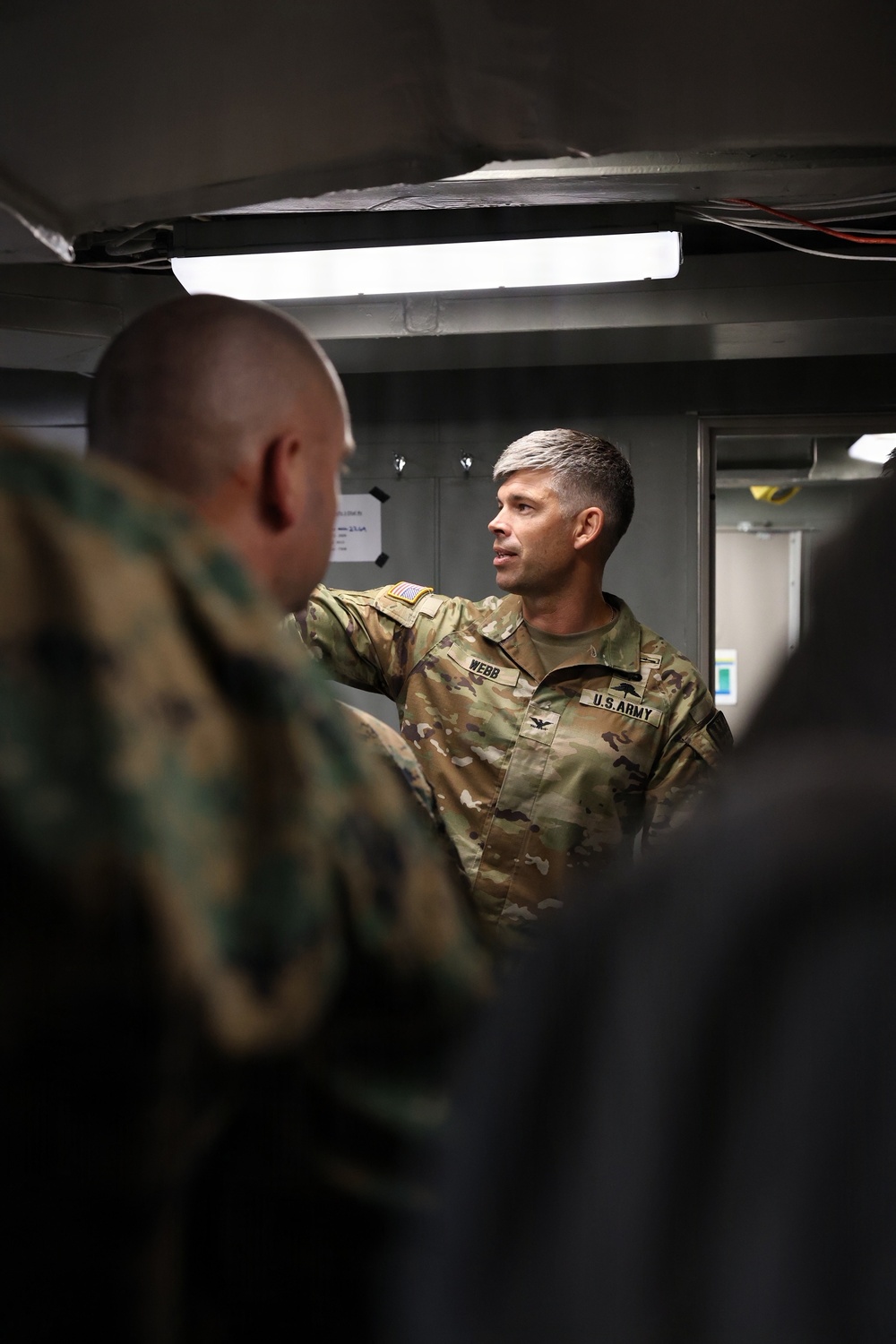 U.S. Army Col. David A. Webb, commander of Joint Task Force-Bravo, briefs a U.S. Department of State delegation.