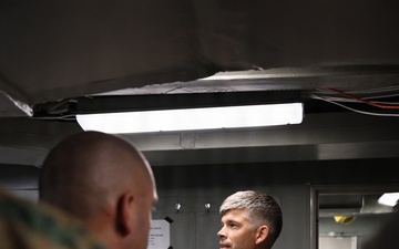 U.S. Army Col. David A. Webb, commander of Joint Task Force-Bravo, briefs a U.S. Department of State delegation.