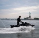 Coast Guard personal watercraft operates near Statue of Liberty during Sail 250