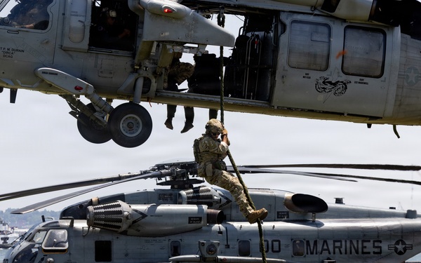 U.S. Marines and Sailors host a static display for International Naval Review 250
