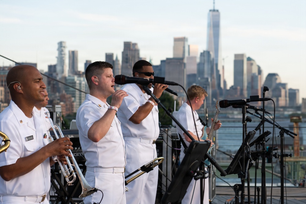 U.S. Navy Band Cruisers perform on Pier 57 at the United Nations fireworks viewing party.