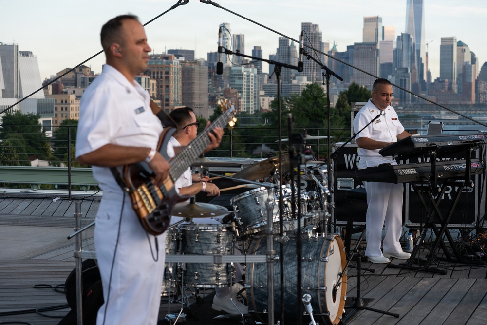 U.S. Navy Band Cruisers perform on Pier 57 at the United Nations fireworks viewing party.