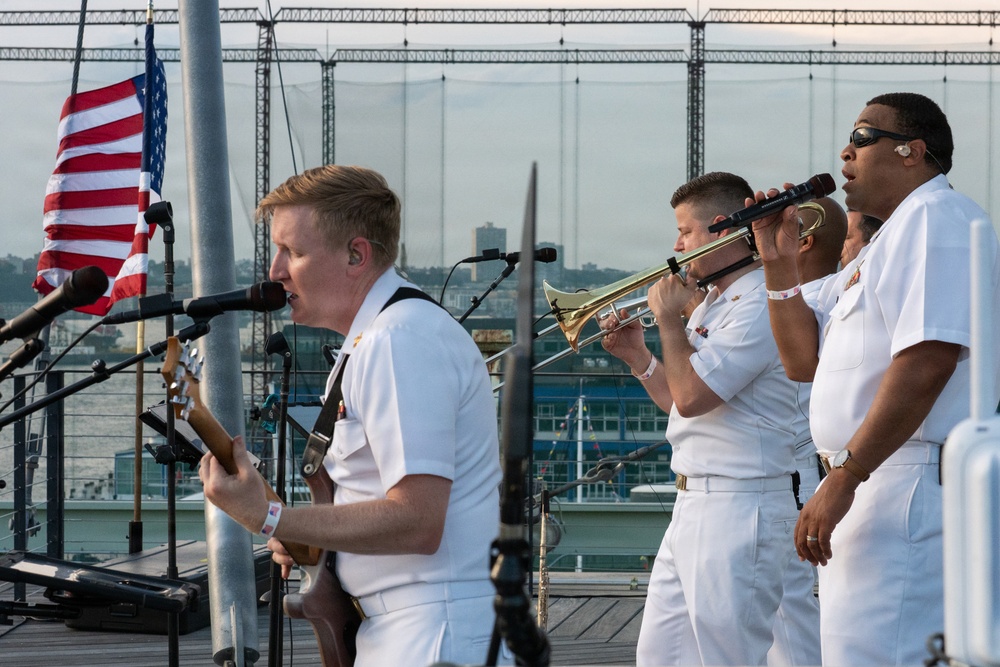 U.S. Navy Band Cruisers perform on Pier 57 at the United Nations fireworks viewing party.