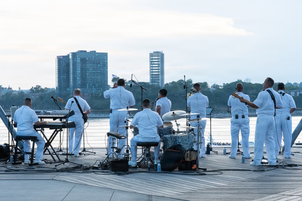 U.S. Navy Band Cruisers perform on Pier 57 at the United Nations fireworks viewing party.