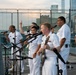 U.S. Navy Band Cruisers perform on Pier 57 at the United Nations fireworks viewing party.