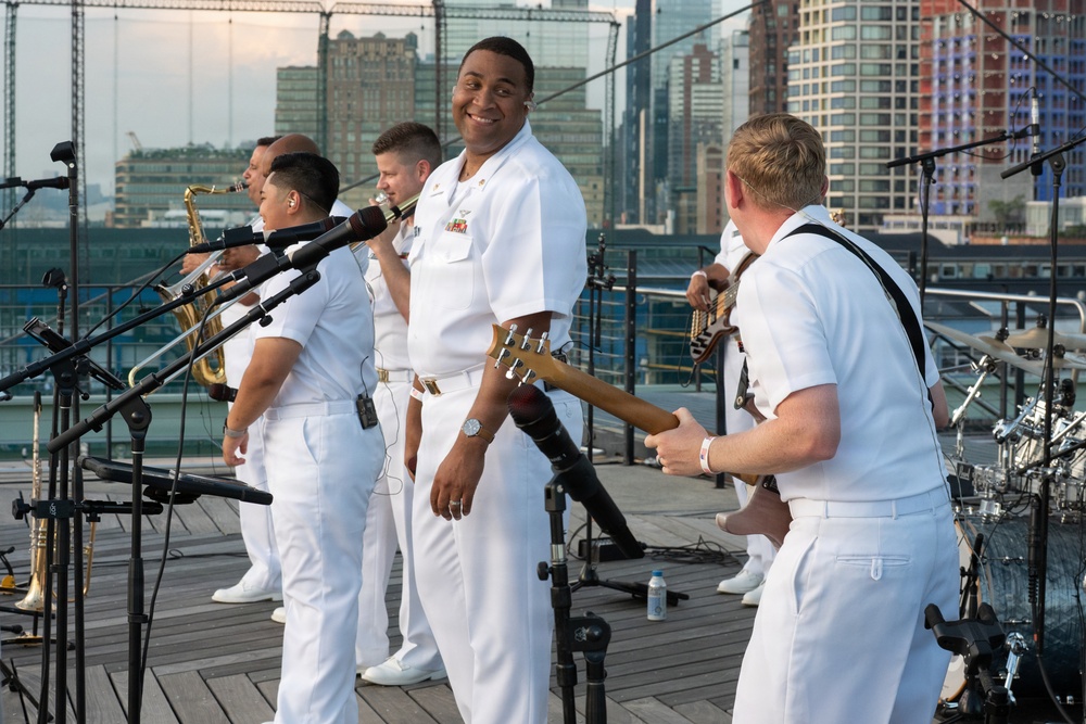 U.S. Navy Band Cruisers perform on Pier 57 at the United Nations fireworks viewing party.