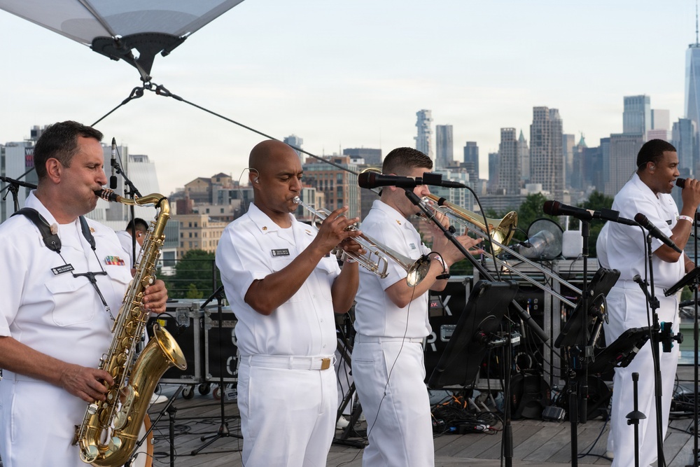 U.S. Navy Band Cruisers perform on Pier 57 at the United Nations fireworks viewing party.