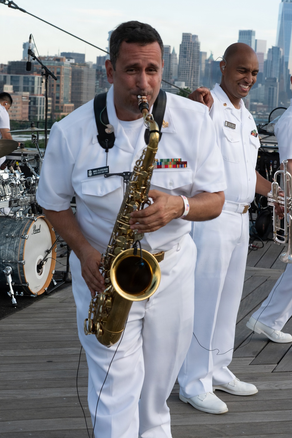 U.S. Navy Band Cruisers perform on Pier 57 at the United Nations fireworks viewing party.