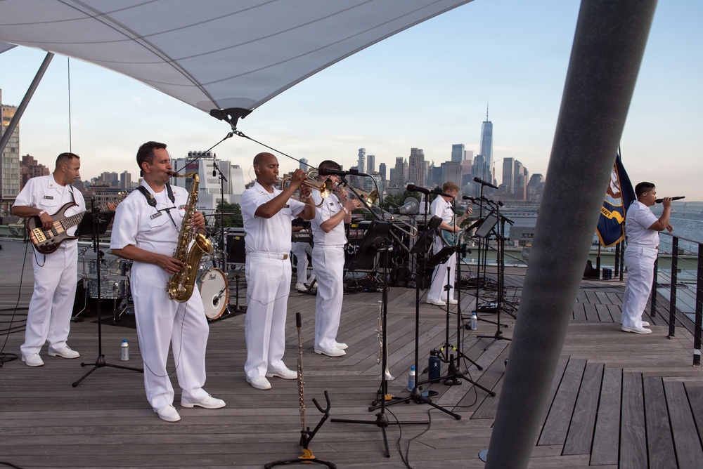 U.S. Navy Band Cruisers perform on Pier 57 at the United Nations fireworks viewing party.