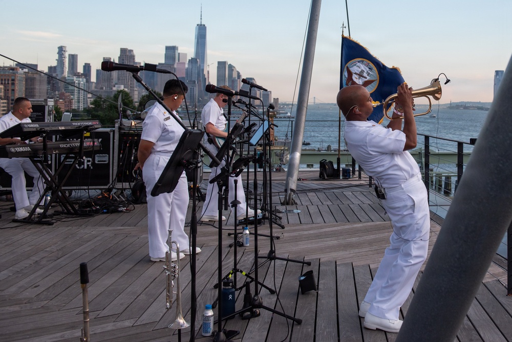 U.S. Navy Band Cruisers perform on Pier 57 at the United Nations fireworks viewing party.