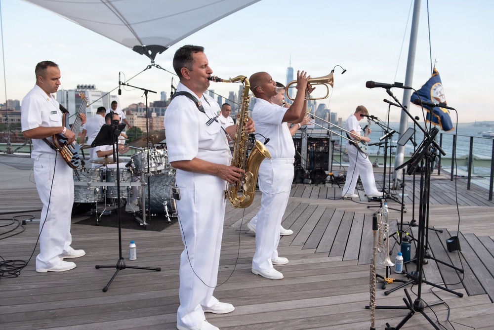 U.S. Navy Band Cruisers perform on Pier 57 at the United Nations fireworks viewing party.