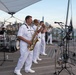 U.S. Navy Band Cruisers perform on Pier 57 at the United Nations fireworks viewing party.