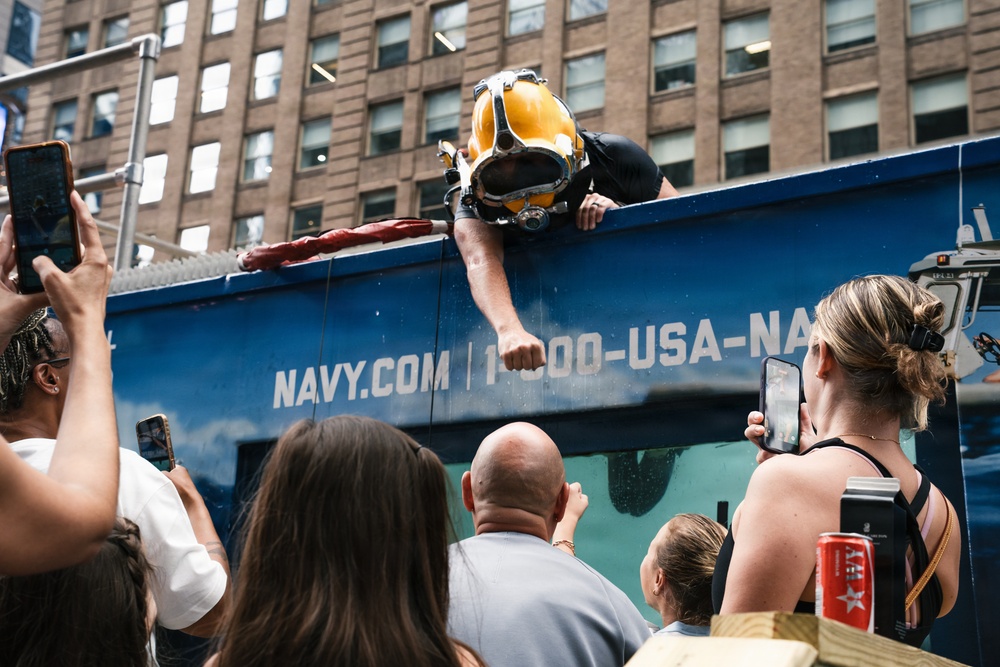 Flag Officer Visit to the U.S. Navy Dive Tank Demonstration in Times Square