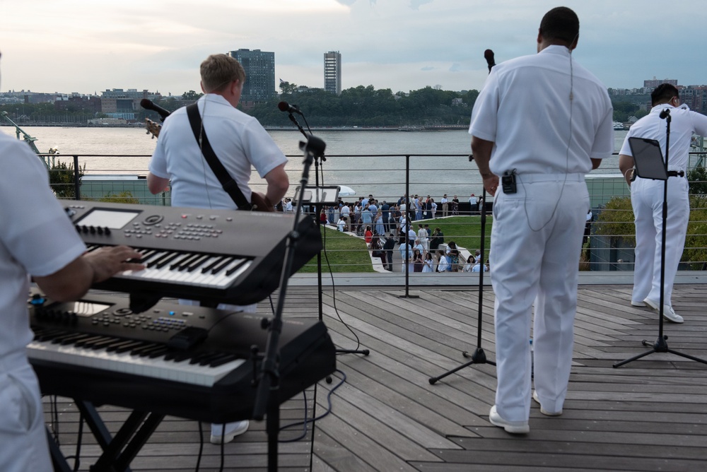 U.S. Navy Band Cruisers perform on Pier 57 at the United Nations fireworks viewing party.