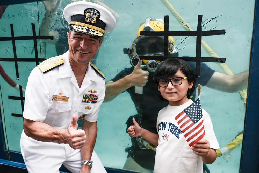 Flag Officer Visit to the U.S. Navy Dive Tank Demonstration in Times Square
