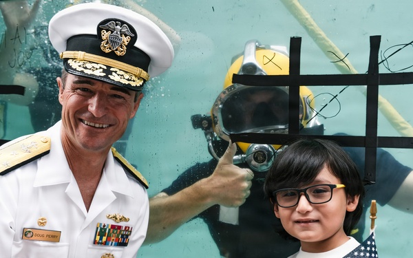 Flag Officer Visit to the U.S. Navy Dive Tank Demonstration in Times Square