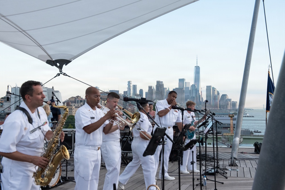 U.S. Navy Band Cruisers perform on Pier 57 at the United Nations fireworks viewing party.