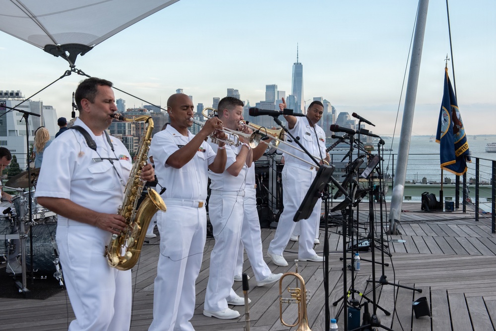 U.S. Navy Band Cruisers perform on Pier 57 at the United Nations fireworks viewing party.
