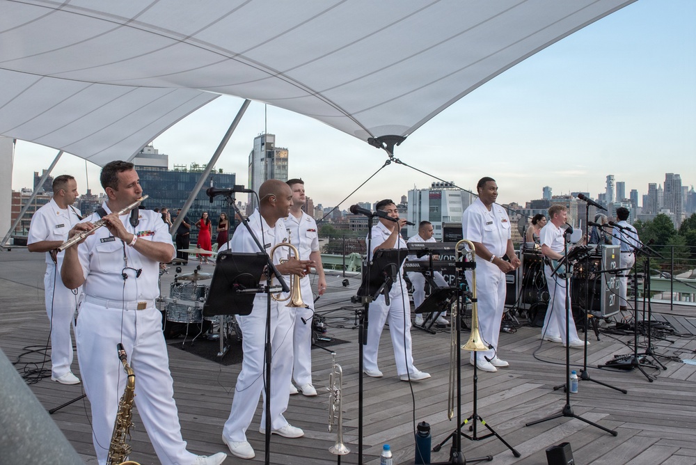 U.S. Navy Band Cruisers perform on Pier 57 at the United Nations fireworks viewing party.