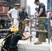 Flag Officer Visit to the U.S. Navy Dive Tank Demonstration in Times Square