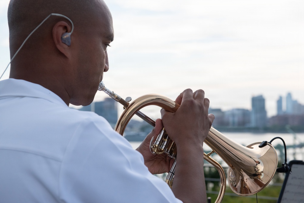 U.S. Navy Band Cruisers perform on Pier 57 at the United Nations fireworks viewing party.