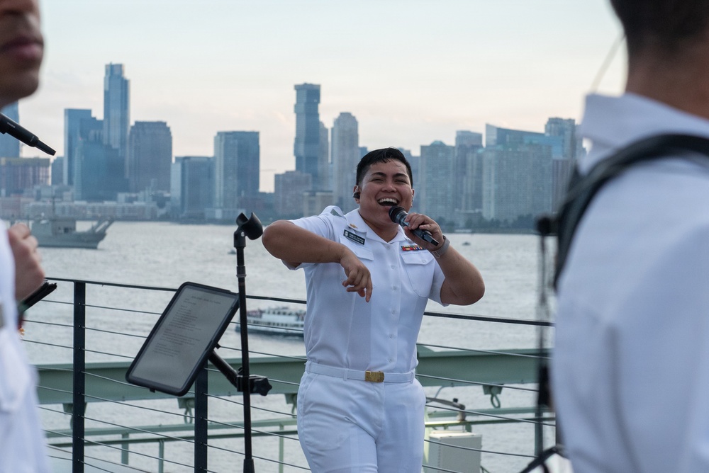 U.S. Navy Band Cruisers perform on Pier 57 at the United Nations fireworks viewing party.