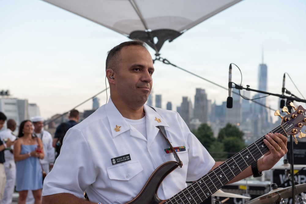 U.S. Navy Band Cruisers perform on Pier 57 at the United Nations fireworks viewing party.