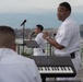 U.S. Navy Band Cruisers perform on Pier 57 at the United Nations fireworks viewing party.