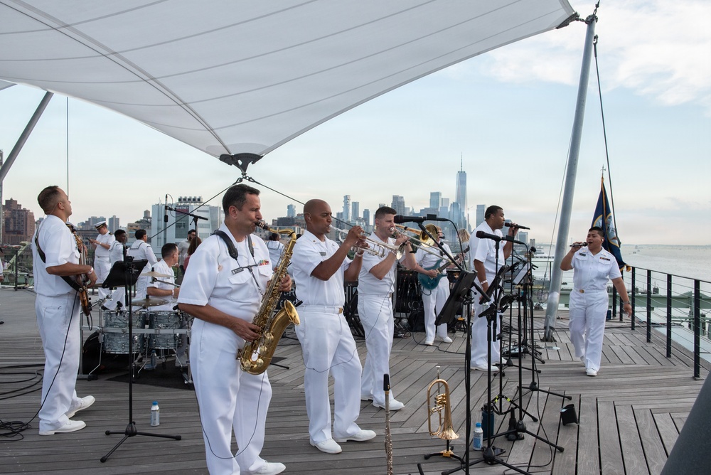 U.S. Navy Band Cruisers perform on Pier 57 at the United Nations fireworks viewing party.