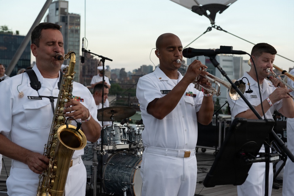 U.S. Navy Band Cruisers perform on Pier 57 at the United Nations fireworks viewing party.