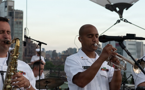 U.S. Navy Band Cruisers perform on Pier 57 at the United Nations fireworks viewing party.