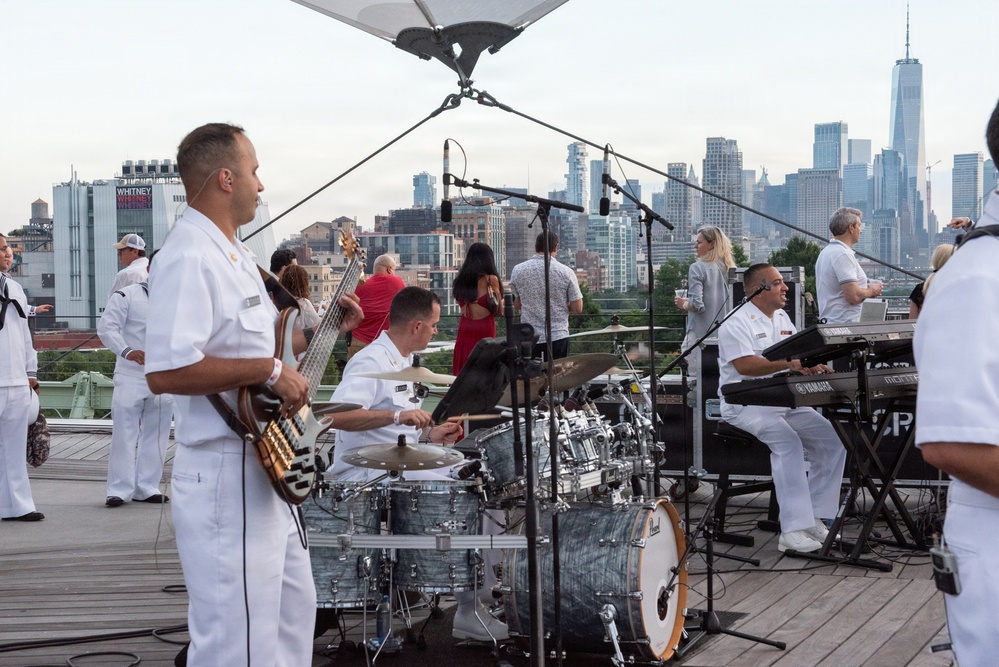 U.S. Navy Band Cruisers perform on Pier 57 at the United Nations fireworks viewing party.