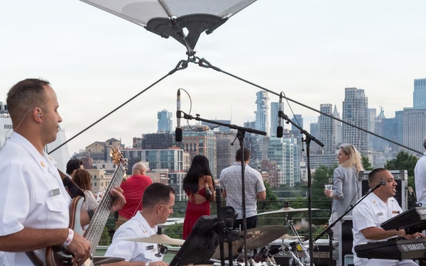 U.S. Navy Band Cruisers perform on Pier 57 at the United Nations fireworks viewing party.