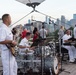 U.S. Navy Band Cruisers perform on Pier 57 at the United Nations fireworks viewing party.
