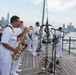 U.S. Navy Band Cruisers perform on Pier 57 at the United Nations fireworks viewing party.