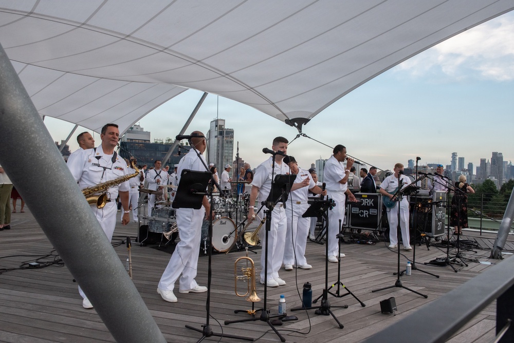 U.S. Navy Band Cruisers perform on Pier 57 at the United Nations fireworks viewing party.