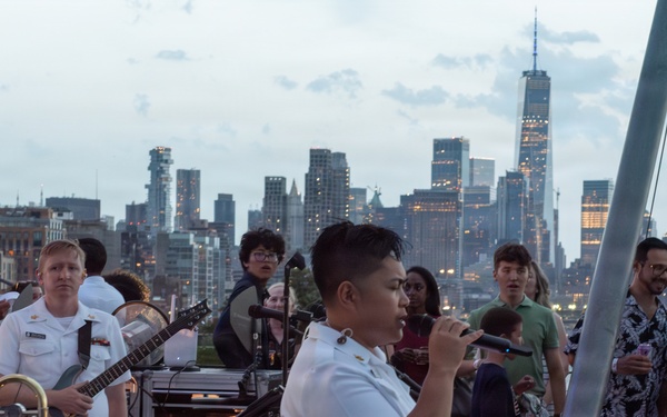 U.S. Navy Band Cruisers perform on Pier 57 at the United Nations fireworks viewing party.