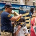 Flag Officer Visit to the U.S. Navy Dive Tank Demonstration in Times Square