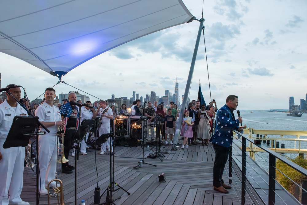 U.S. Navy Band Cruisers perform on Pier 57 at the United Nations fireworks viewing party.