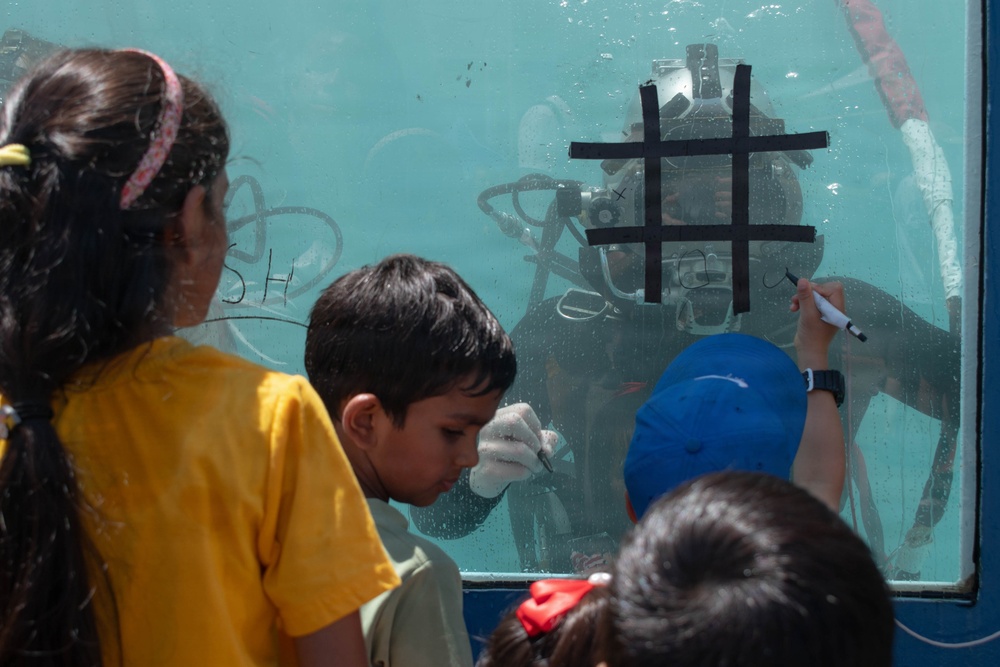 U.S. Coast Guard divers highlight Sail 250 events at the Pier 86