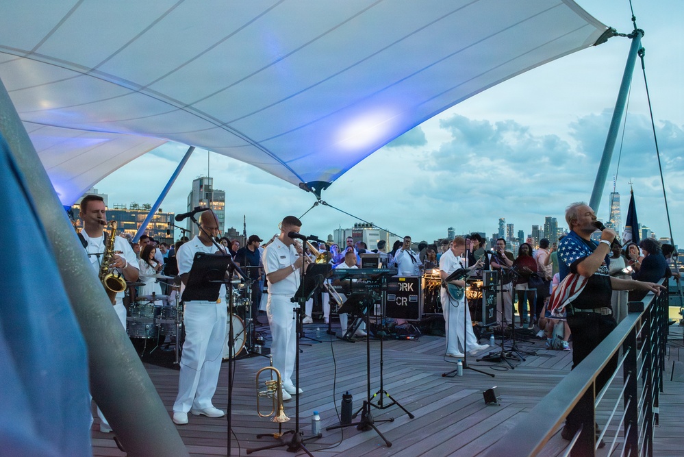 U.S. Navy Band Cruisers perform on Pier 57 at the United Nations fireworks viewing party.