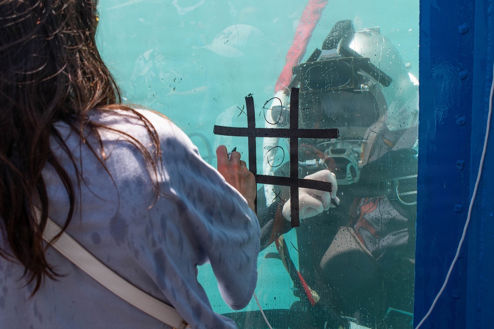 U.S. Coast Guard divers highlight Sail 250 events at the Pier 86