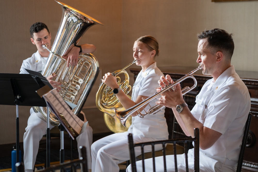 U.S. Navy Band Brass Quintet performs at the New York Athletic Club