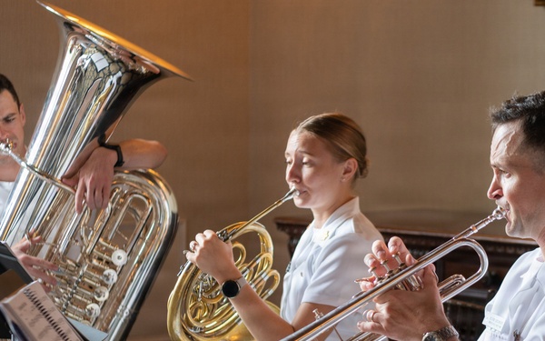 U.S. Navy Band Brass Quintet performs at the New York Athletic Club